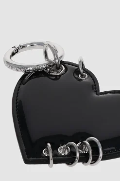 Justine Clenquet Heart black patent charm Outlet
