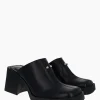 Justine Clenquet Raya black mules Online